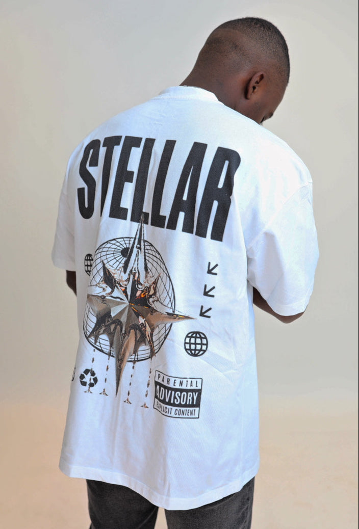 Person wearing a white t-shirt with 'Stellar' branding on the back.